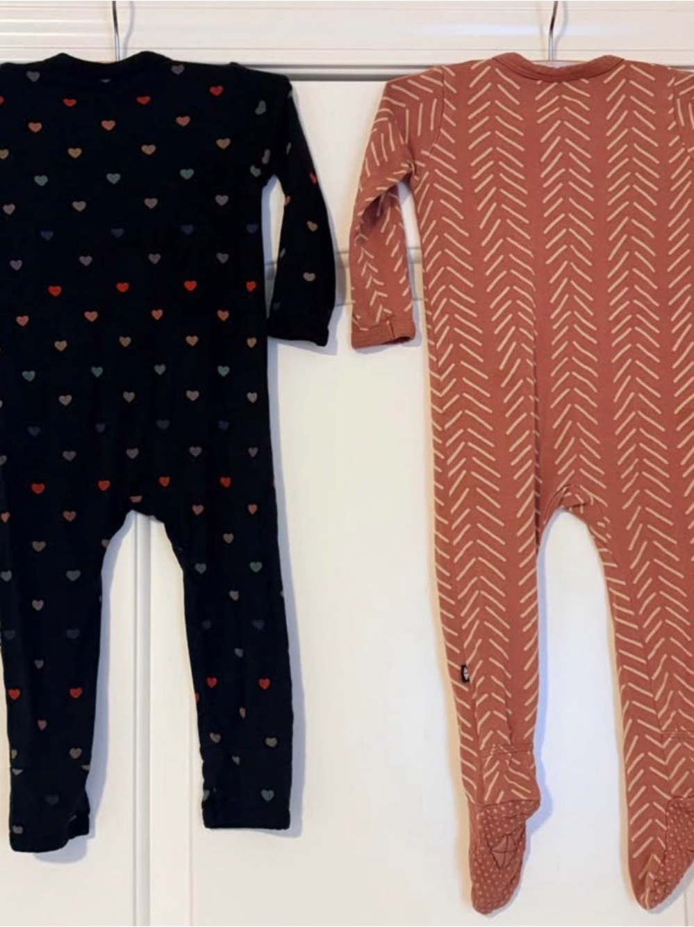 Kyte BABY Black Heart & Rust Arrow Footed One-Pieces